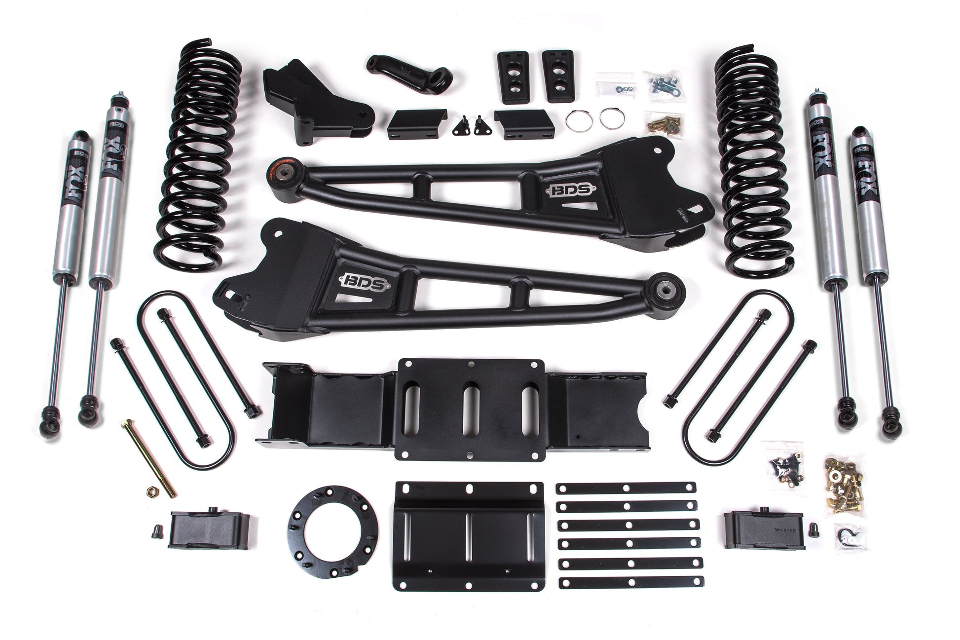 A variety of automotive suspension system components, including shocks, springs, control arms, brackets, screws, bolts, and other hardware from the BDS 4 Inch Lift Kit with Radius Arm for the 2019-2023 RAM 3500 4WD Gas model, all laid out systematically against a white background.