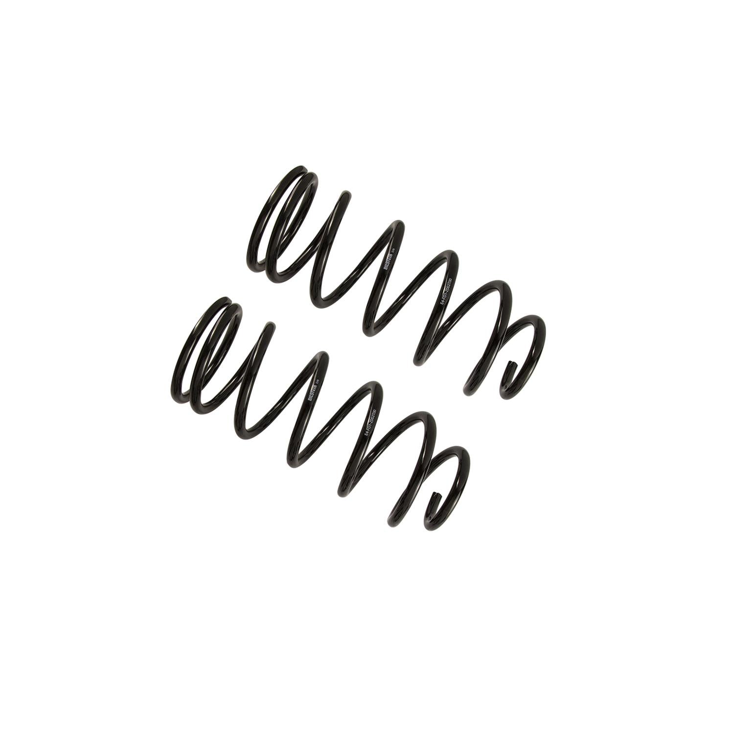 Two small, coiled compression springs made of black metal are shown against a plain white background. The springs have a uniform thickness and are positioned parallel to each other, slightly overlapping, reminiscent of the Bilstein 1.5-2.5-Inch Rear Lift Springs for the FJ Cruiser, designed by Bilstein Shocks for optimum performance in suspension dynamics.