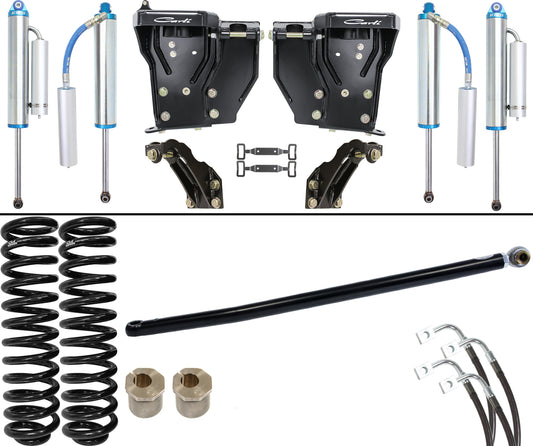 The Carli Suspension 05-07 Ford F-250/F-350 (4WD) Diesel 2.5" Lift Dominator System includes King 3.0 shocks, two coil springs, adjustable shocks with blue hoses, upper and lower control arms, mounting brackets, and additional hardware components on a white background.