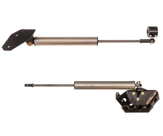 The Carli Suspension 03-13 Dodge RAM 2500/3500 (4WD) Opposing Stainless Steel Stabilizer Kit, designed for T-Style steering systems with a 3"-6" lift, features two stainless steel shock absorbers. One absorber is depicted with an extended piston rod, while the other is connected to an adjustment mechanism. Both components have metallic cylinders and black mounting brackets and are showcased against a white background.