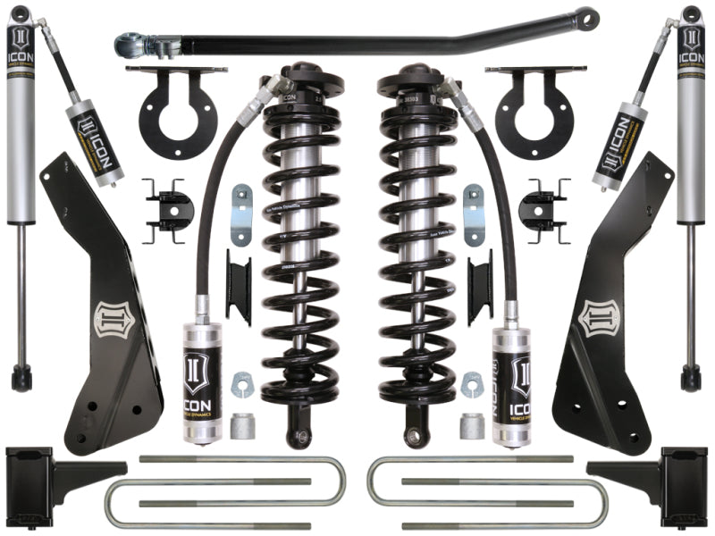 The image features the ICON 11-16 Ford F-250/F-350 4-5.5in Stage 1 Coilover Conversion System, displaying a selection of off-road suspension components arranged systematically on a white background. Included are height-adjustable coil springs, shocks, brackets, and various mounting hardware, all illustrating their performance potential.