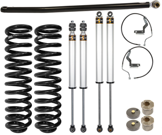 The Carli Suspension 11-16 Ford F-250/F-350 (4WD) GAS 2.0" Lift Commuter System is perfect for enhancing on-road ride quality. It includes two large black coil springs, two silver shock absorbers with mounting brackets, a long black rod, black cables, and small circular metal components—all expertly designed to fit within this lift kit.