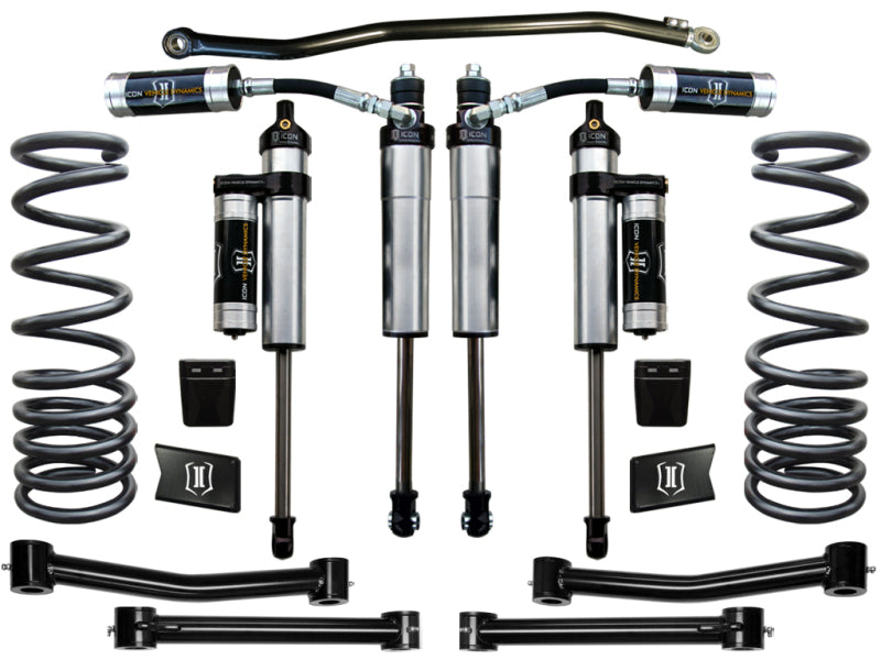 The ICON 03-12 Dodge Ram 2500/3500 4WD 2.5in Stage 4 Suspension System features an automotive suspension set with coil springs, ICON V.S. Series Shocks equipped with remote reservoirs, control arms, and other components meticulously arranged symmetrically on a white background.