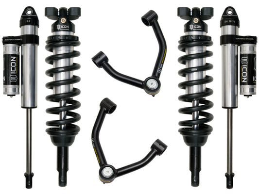 The ICON 2015+ Chevrolet Colorado 1.75-3in Stage 3 Suspension System exhibits robust corrosion resistance with two coilovers, two shock absorbers, and upper control arms featuring Delta Joint technology. Each component is symmetrically arranged on a white background and proudly displays the "ICON" branding.