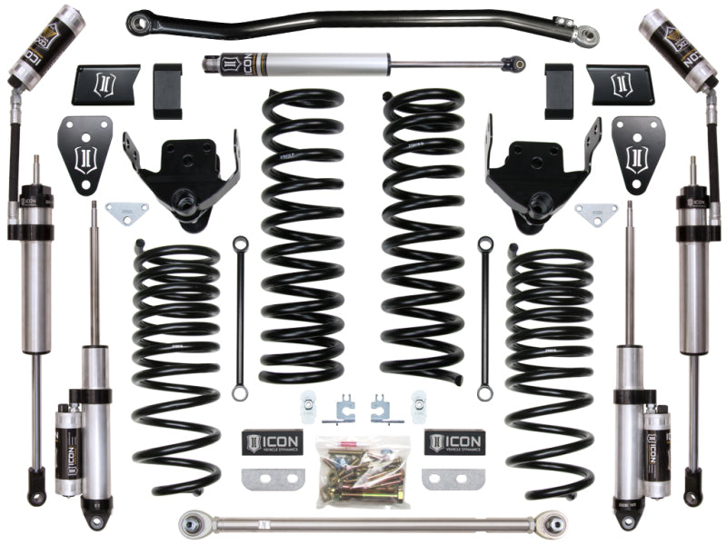 A neatly arranged set of vehicle suspension components, featuring shock absorbers, performance rear coil springs, brackets, and hardware from the ICON 14-18 Ram 2500 4WD 4.5in Stage 4 Suspension System, is displayed on a white background. Several components proudly showcase the "ICON" brand logo—ideal for off-road adventures and ensuring a smooth ride.