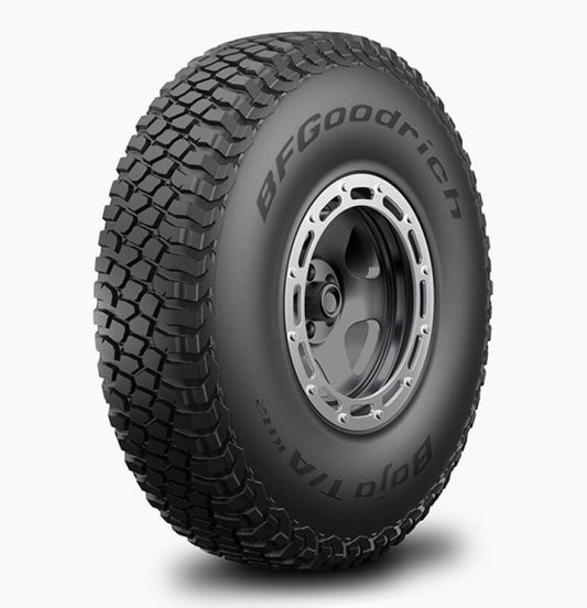 A BFGoodrich Baja T/A KR2 SC 35X10.50R15LT Class 10 tire featuring a rugged tread pattern, ideal for off-road use. The tire is black with silver rims and has the brand name and model embossed on the sidewall.