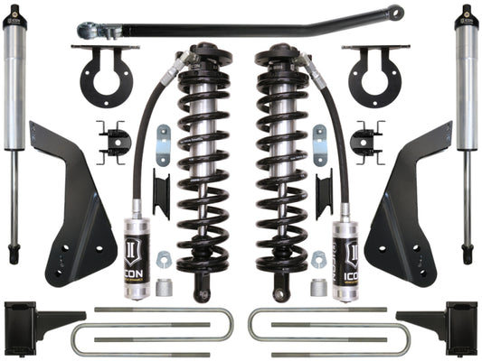 An all-inclusive ICON 08-10 Ford F-250/F-350 4-5.5in Stage 2 Coilover Conversion System displayed on a white background, featuring two coil springs, two shock absorbers, and various mounting brackets and hardware. The components are predominantly black with metallic accents to ensure ride height adjustability.