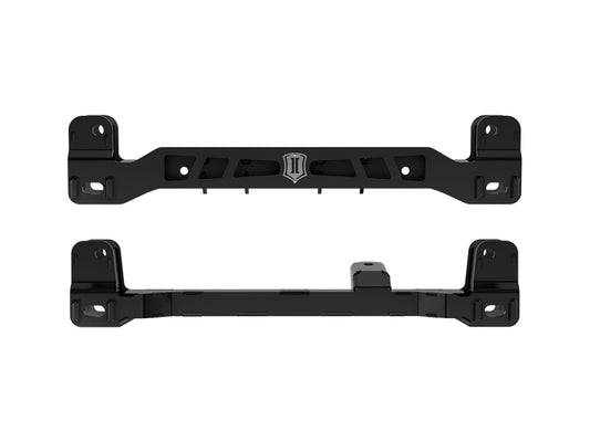 The ICON 22-23 Toyota Tundra Front Box Kit 1 by ICON includes two black metal brackets showcased from various angles. The top bracket boasts a raised emblem at the center, making it perfect for Lift Performance Suspension on your Toyota Tundra. Both brackets are engineered for mounting or structural support, featuring multiple holes for easy attachment—ideal for off-road driving adventures.