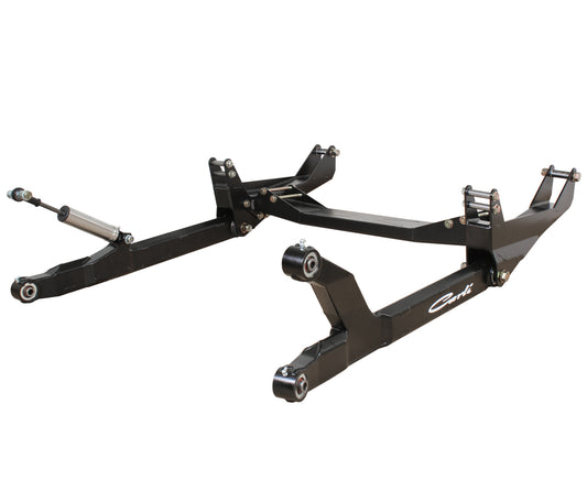 A black metal suspension frame featuring mounting points and a compact hydraulic component, commonly used in automotive settings. With its sleek, angular lines, this "Cork"-labeled frame is the Carli Suspension 10-13 Dodge RAM 2500/3500 (4X4) Long Arm System & HD X-Member with a 6" lift, designed to integrate seamlessly for improved axle articulation.