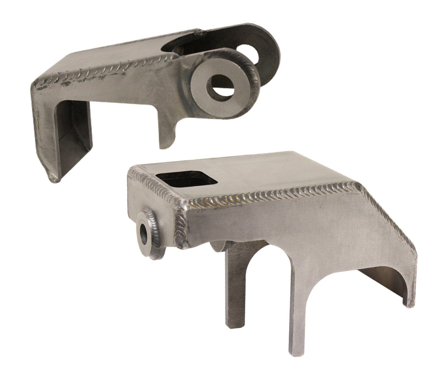 A pair of metallic brackets, designed as weld-in shock mounts for the rear of a 4WD Dodge RAM 2500/3500 (03-13 models), featuring a robust and industrial design by Carli Suspension. One bracket is tilted, and the other stands upright, both showcasing visible screw holes with welded edges and various cutouts.