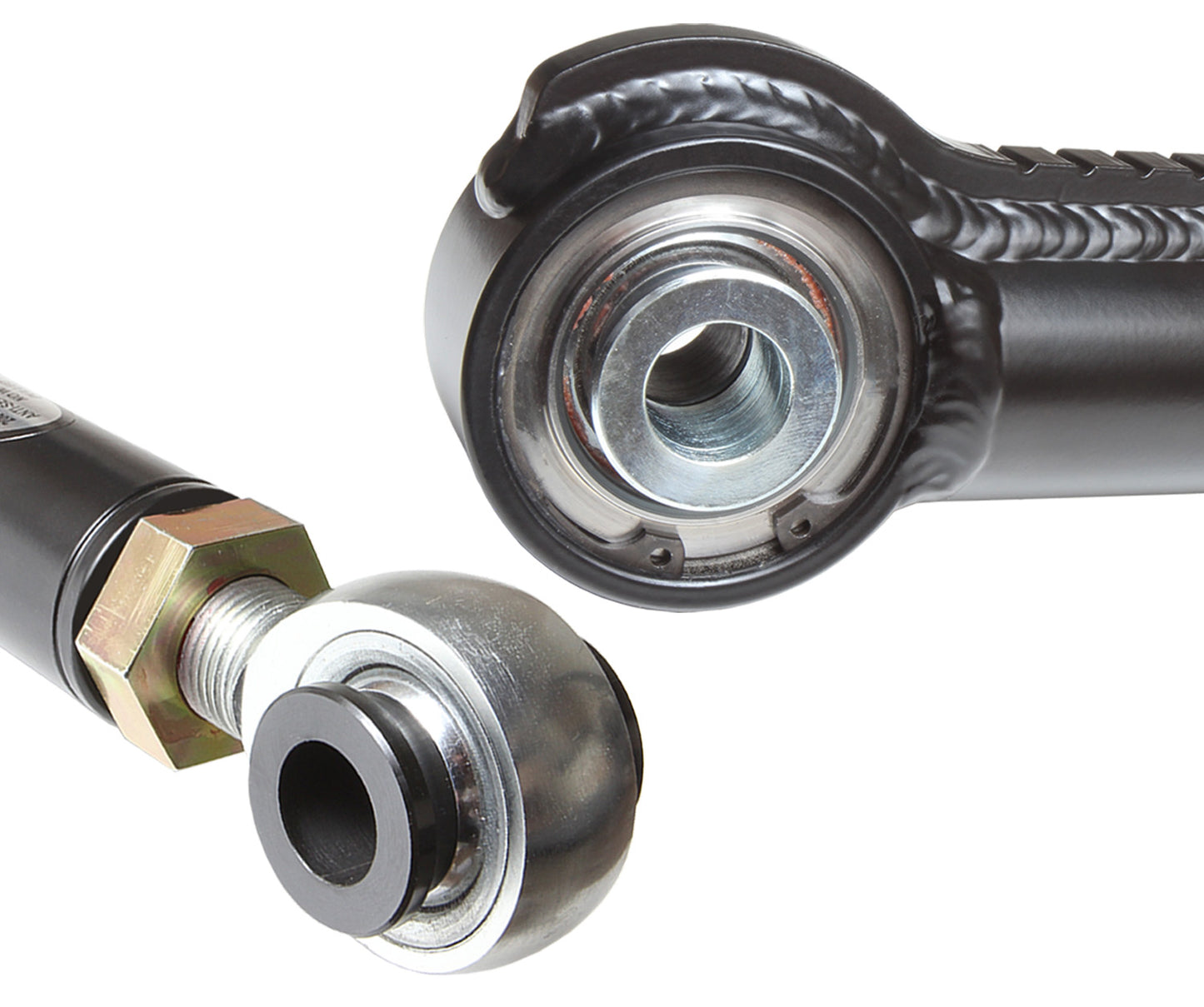 Close-up of a mechanical joint featuring two metal components, this image showcases an adjustable rod end with a spherical bearing and a threaded hexagonal bolt. Designed for heavy-duty applications like the Carli Suspension 03-13 Dodge RAM 2500/3500 (4WD) Adjustable Track Bar with 0-3" lift, the components boast a shiny, metallic finish.