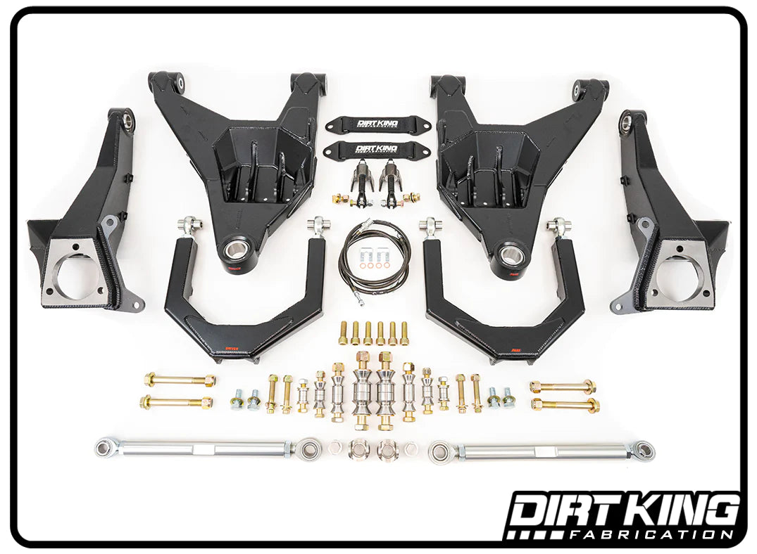 An array of black suspension components and hardware laid out neatly on a white background. The components, part of the DIRT KING 99-06 GM 1500 Race Long Travel Kit, include control arms, bolts, nuts, washers, spacers, and rods. The "DIRT KING Fabrication" logo is visible in the bottom right corner.