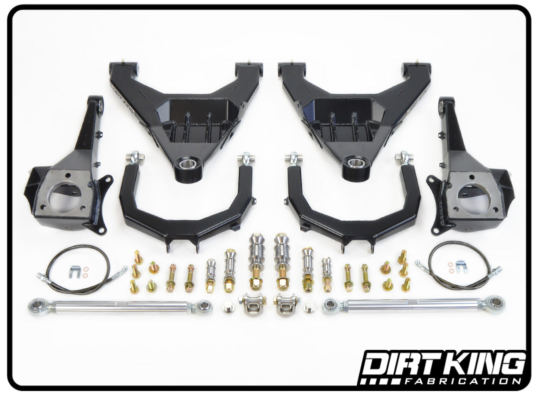 A well-organized collection of off-road suspension components from DIRT KING, specifically the 09-12 RAM 1500 Race Long Travel Kit, displayed on a white background. The set includes control arms, bolts, washers, and other hardware designed for conquering off-road terrain, with the DIRT KING logo in the bottom right corner.