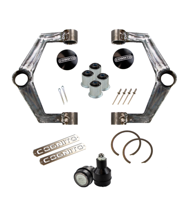 The Cognito Motorsports Ball Joint SM Series Upper Control Arm Builders Kit for 2020-2024 Silverado/Sierra 2500/3500 2WD/4WD includes two welded metal control arms, four cylindrical bushings, four pins, a maintenance-free ball joint with a corrected angle, two COGNITO badges, and various small circular and ring-like components, all displayed on a white background.