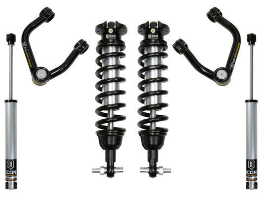 The image showcases the ICON 2019+ Ford Ranger 0-3.5in Stage 2 Suspension System w/Tubular Uca by ICON, featuring two black and silver coil-over shocks with springs, two upper control arms equipped with Delta Joint technology, and two shock absorbers. All components are designed to enhance vehicle suspension.