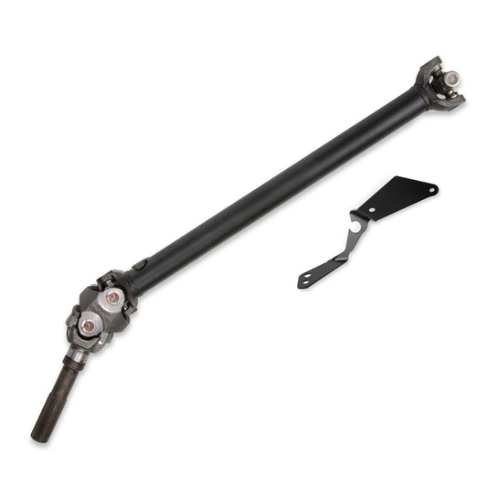 A black driveshaft for a vehicle is showcased, specifically featuring the Cognito Motorsports CV Front Driveline Kit For 4-6 Inch Lift 01-16 Silverado/Sierra 2500/3500 and 7-12 Inch Lift 99-06 Silverado/Sierra 1500. The shaft is cylindrical with universal joints on both ends. An unattached black metal bracket, likely an Allison Transmission Bracket, lies to the right of the driveshaft. The background is plain white.