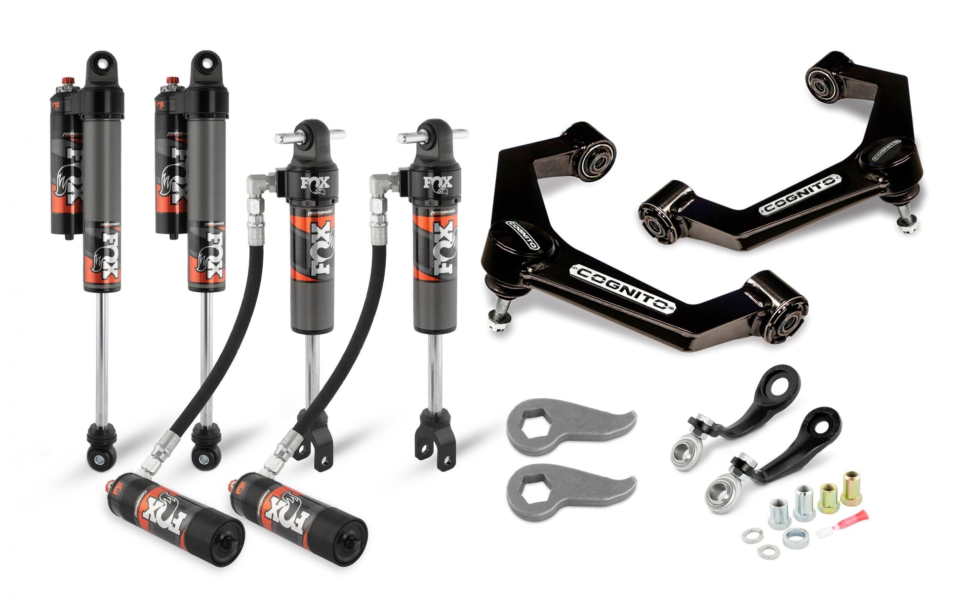 A Cognito Motorsports 3-Inch Elite Leveling Kit for 20-24 Silverado/Sierra 2500/3500 2WD/4WD, featuring two pairs of Fox Elite 2.5 Reservoir Shocks, a pair of control arms from the Cognito components line, adjustment wrenches, and various mounting hardware pieces—all arranged against a white background.