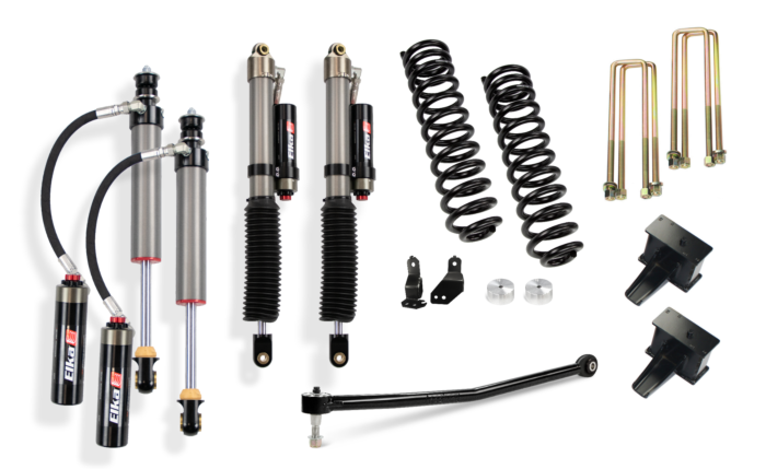 A collection of automotive suspension components including Elka 2.5 Remote Reservoir Shocks, coil springs, U-bolts, and various mounting brackets from Cognito Motorsports' 3-Inch Elite Lift Kit for the 20-23 Ford F-250/F-350 4WD model. Ideal for your leveling kit, the parts are arranged on a white background.