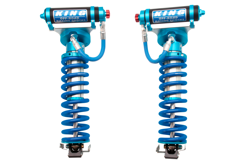 Two King Shocks 2005+ Ford F-250 4WD Front 3.0 Dia Remote Res Coilover Conv w/Adjuster (Pair) in blue and silver, featuring coiled springs and attached reservoirs. This heavy-duty suspension system includes multiple components like adjustable settings and high-quality build materials, making it an ideal OEM Performance Upgrade Kit.