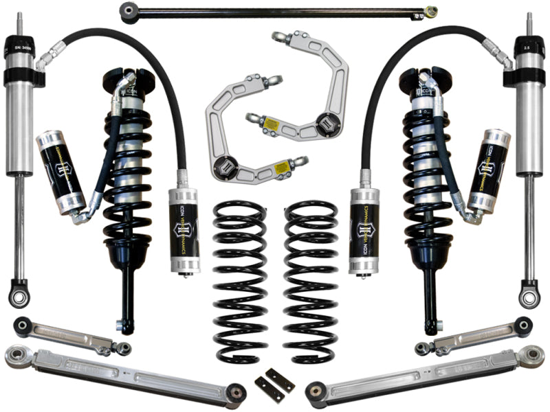 Image of the ICON 03-09 Toyota 4Runner/FJ 0-3.5in Stage 6 Suspension System w/Billet UCA laid out on a white background. The kit includes ICON's patented coilover shocks, coil springs, Delta Joint upper control arms, sway bars, and various mounting hardware pieces. All components appear organized symmetrically.