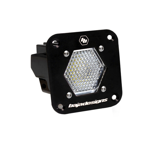 The Baja Designs LED Light Pod Flush Mount Clear S1 Work/Scene Pattern showcases a honeycomb-patterned lens, mounted on a sleek black frame with "Baja Designs" branding at the bottom. Its work/scene pattern is ideal for efficiently illuminating wide areas.