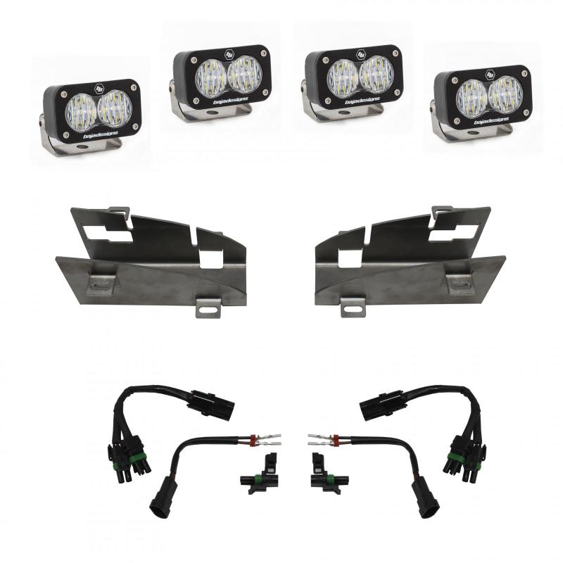 Introducing the ultimate off-road adventure companion: the Baja Designs 2019+ Dodge Ram Rebel 1500 S2 Dual Fog Pocket Kit. This kit includes four rectangular LED light pods, two metal mounting brackets, and two sets of wiring harnesses with connectors. Each pod features multiple small LED bulbs encased in a durable housing to ensure long-lasting performance.