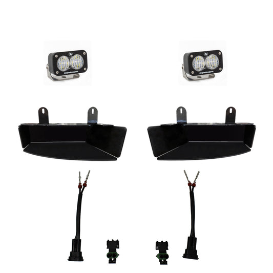 Image displaying the Baja Designs 2019+ Ram 2500/3500 S2 Sport Fog Pocket Kits - White. The set includes two rectangular LED fog lights, two black mounting brackets, and associated wiring with connectors. All components are arranged separately on a white background.