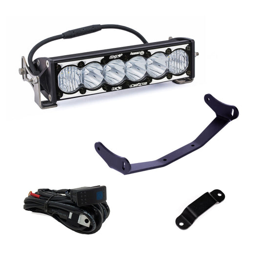 The Baja Designs Can-Am Maverick R 10in OnX6+ Laser Hybrid Shock Tower Kit comes with a rectangular LED light bar, four LED lenses, mounting brackets, wiring harness, and switch. Perfect for installing on vehicles like the Can-Am Maverick or upgrading with OnX6+ Laser lights for off-road use.