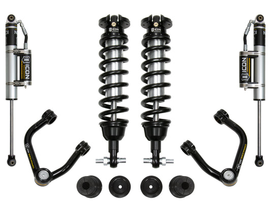 Image of the ICON 2019+ Ford Ranger 0-3.5in Stage 3 Suspension System w/Tubular Uca displayed on a white background. The kit includes two ICON-branded coilovers with attached shock absorbers, two additional shock absorbers, Delta Joint upper control arms for enhanced corrosion resistance, and other smaller components.