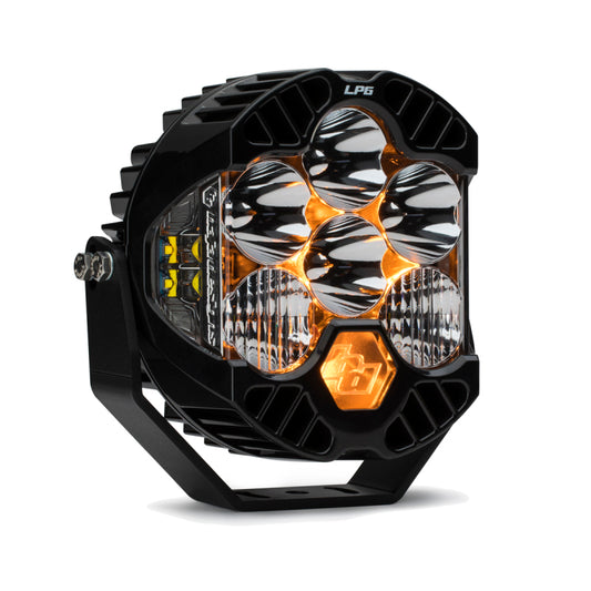 The Baja Designs LP6 Pro Driving/Combo 6in LED spotlight features six circular lights in a black hexagonal casing with reflective surfaces. It includes a sturdy mounting bracket and displays "LP6" with a stylized logo, merging functionality with sleek design.