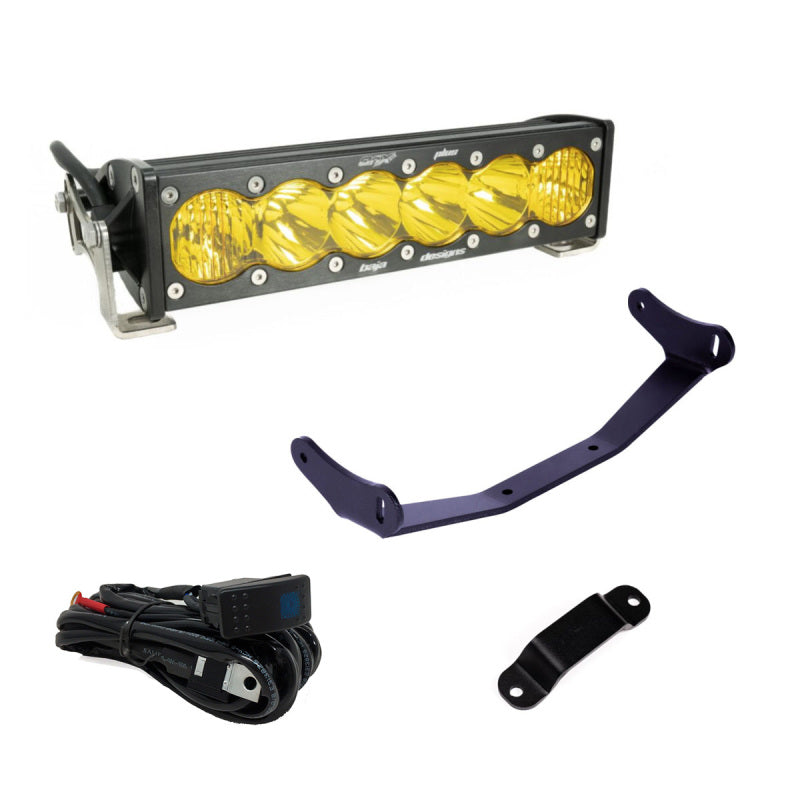 The Baja Designs Can-Am Maverick R Amber 10in OnX6+ Shock Tower Kit includes amber LED light bar, yellow lenses, mounting hardware, wiring harness with switch, and extra brackets for your Can-Am Maverick's shock tower kit.