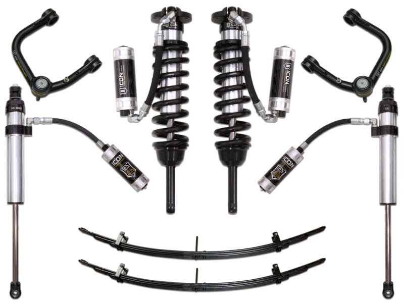 A set of ICON 05-15 Toyota Tacoma 0-3.5in/2016+ Toyota Tacoma 0-2.75in Stg 6 Suspension System w/Tubular Uca displayed on a white background, featuring coilover shocks with reservoirs, billet aluminum upper control arms with Delta Joint technology, leaf springs, and additional hardware, all branded with the name "ICON.